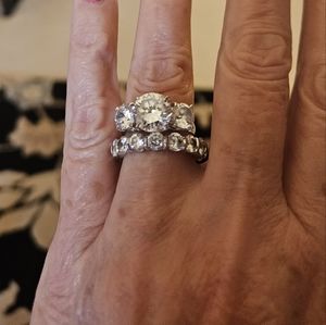 Fantasia wedding band and engagement ring. 925 silver about 8 or 9 carats CZ